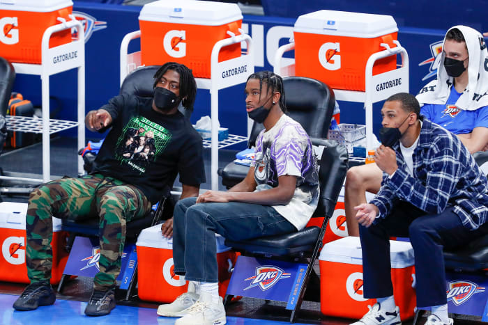 Lu Dort, Shai Gilgeous-Alexander and Darius Bazley on the bench